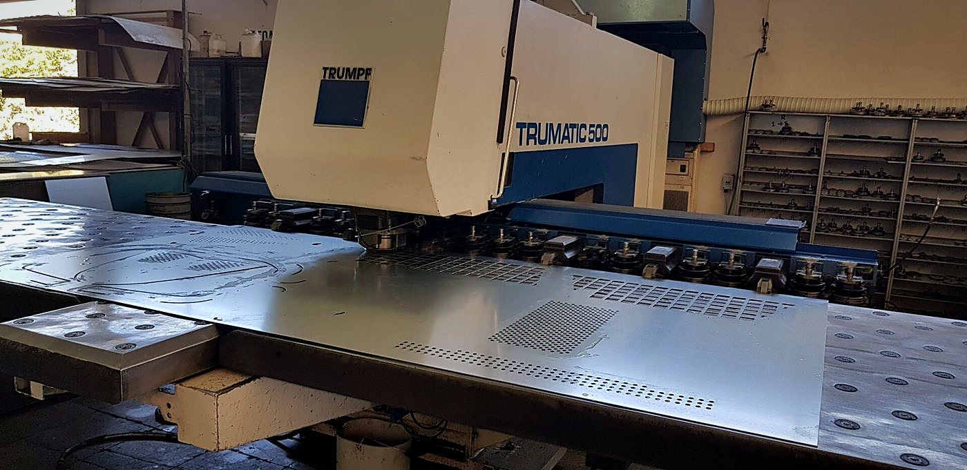 TRUMPF TRUMATIC 500 punching a perforated pattern into sheet steel